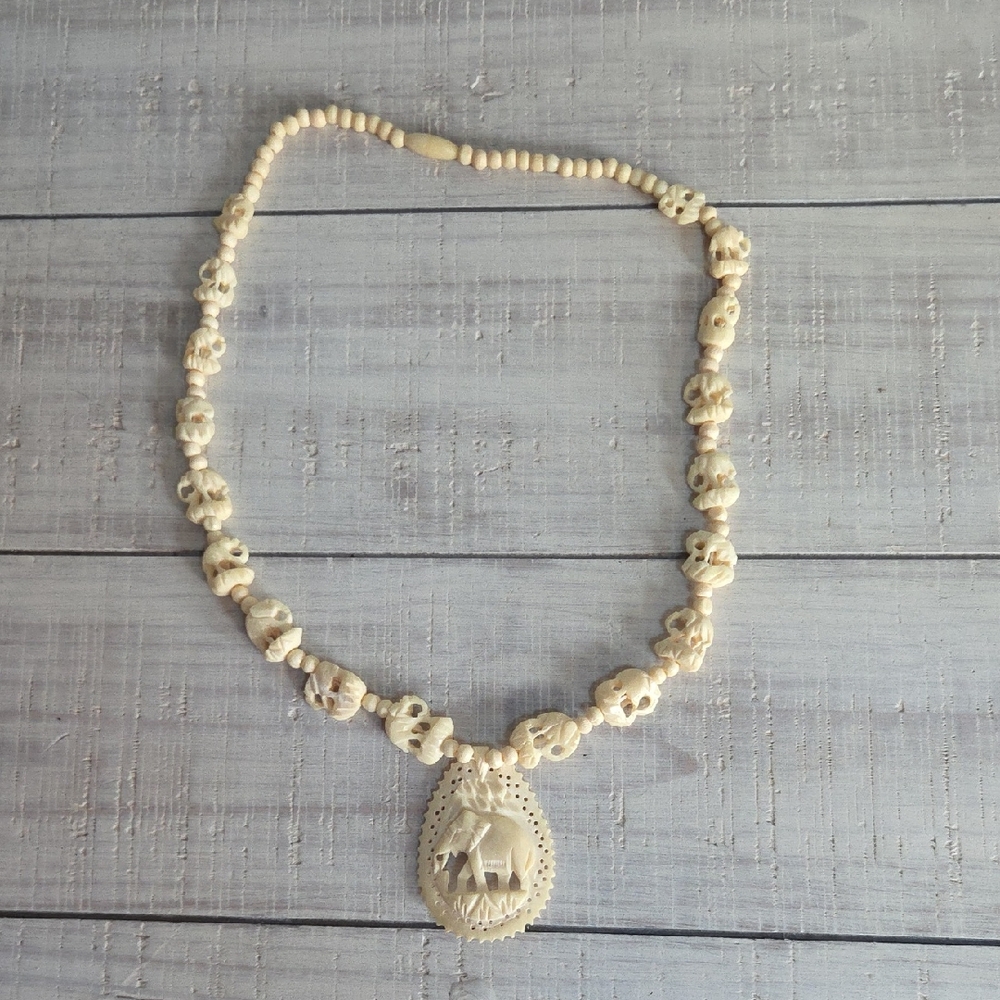 Vintage carved elephant necklace